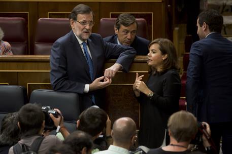 25/08/2015. Rajoy asiste al debate de totalidad de los Presupuestos de 2016. El presidente del Gobierno, Mariano Rajoy, y la vicepresidenta,...