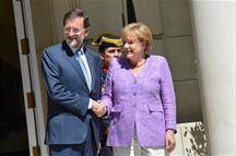 Rajoy junto a Merkel