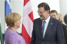 Mariano Rajoy junto a Angela Merkel