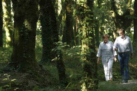 24/08/2014. Rajoy y Merkel en un tramo del Camino de Santiago. El presidente del Gobierno, Mariano Rajoy, y la canciller de la República Fed...