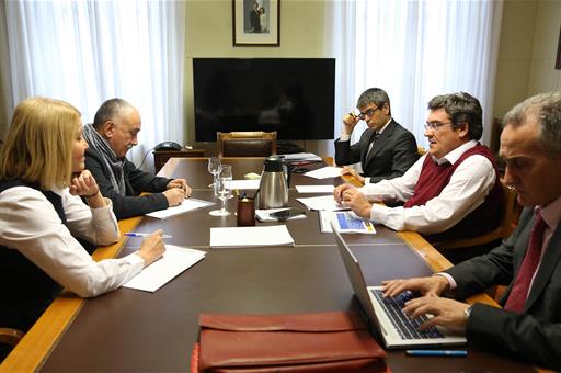 José Luis Escrivá durante la reunión con el secretario general de UGT