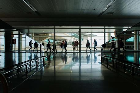 Pasajeros en un aeropuerto