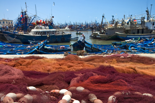 Barcos y redes de pesca